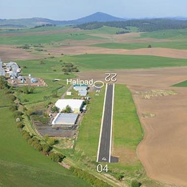 Willard Field Airport Runway located in flat grasslands.