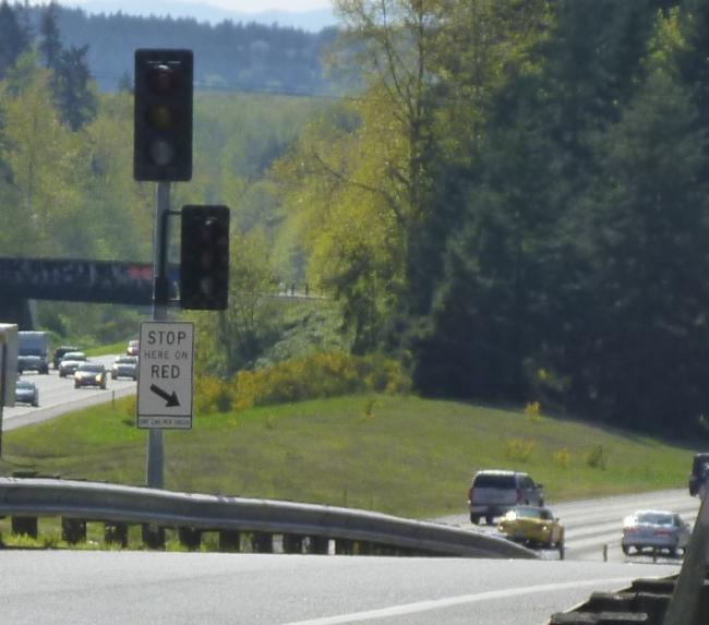 Image of a ramp meter signal on an on-ramp with displays dark (off).