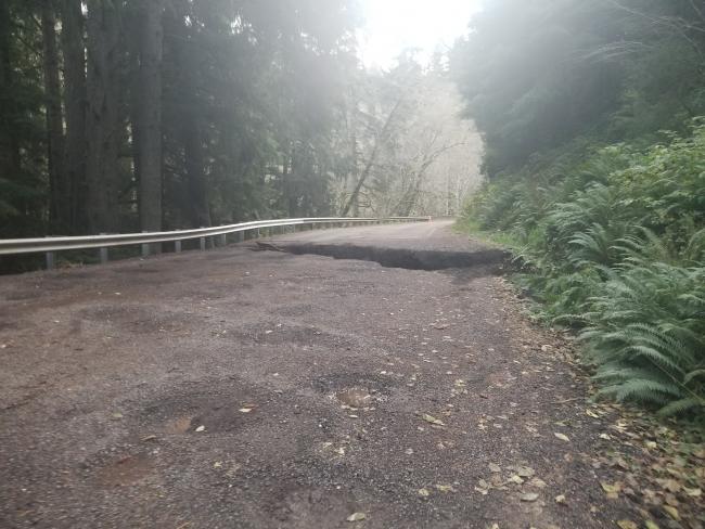 A large crack in the pavement along SR 112 at Jim Creek requires an emergency contract to repair and reopen.