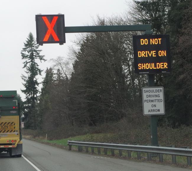 Image of closed part-time shoulder with red X and electronic sign.